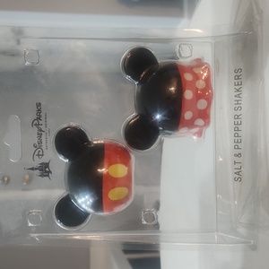 Brand new Disney parks authentic original salt and pepper shaker. Ears
